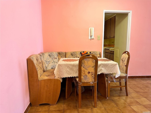 view of tiled dining space