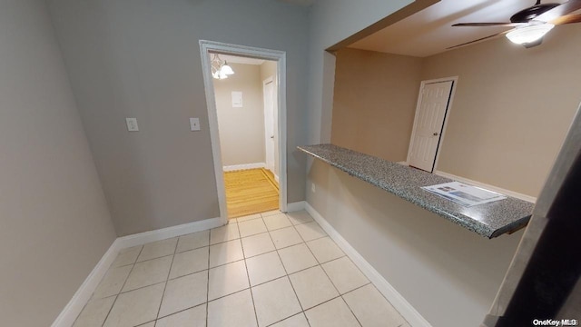 interior space featuring light tile patterned floors