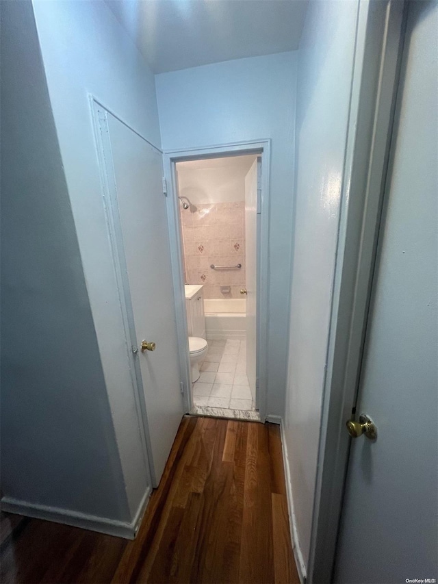 hallway featuring hardwood / wood-style floors