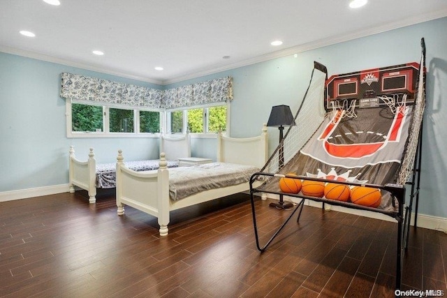 bedroom featuring dark hardwood / wood-style flooring and ornamental molding