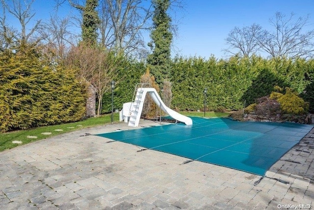 view of pool with a patio area