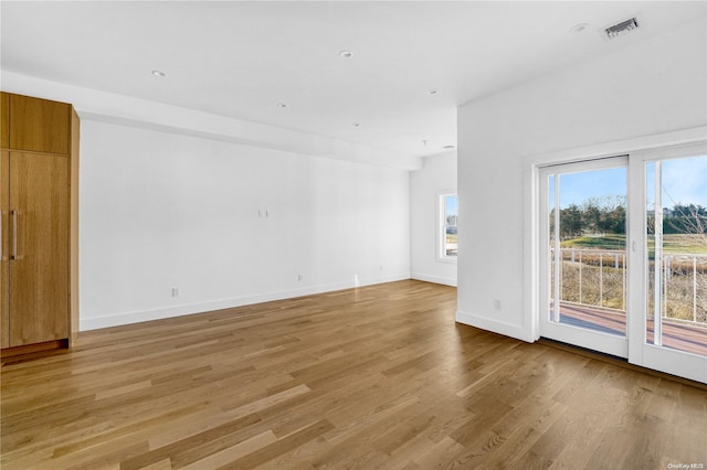 empty room featuring light hardwood / wood-style floors