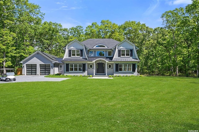 293 Beaver Dam Rd, Brookhaven, NY 11719 - shingle-style home with driveway, a gambrel roof, a front yard, and a standing seam roof