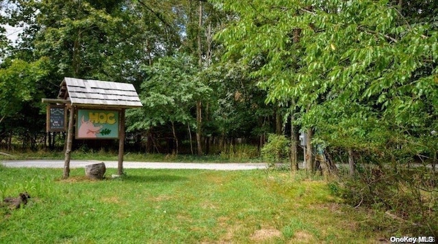293 Beaver Dam Rd, Brookhaven, NY 11719 - view of grassy yard