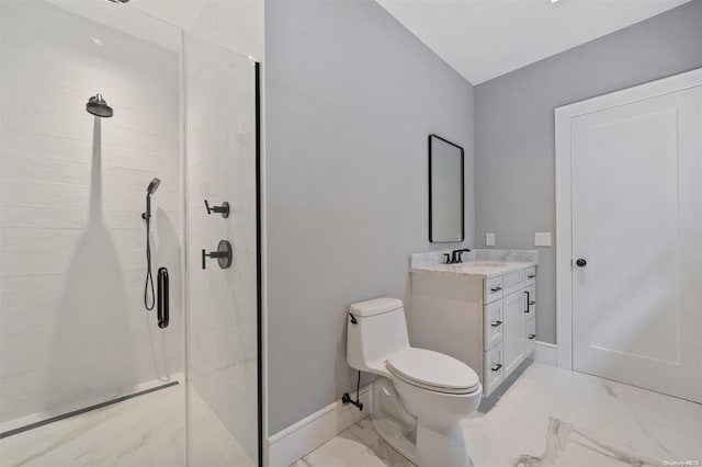 bathroom featuring vanity, a tile shower, and toilet