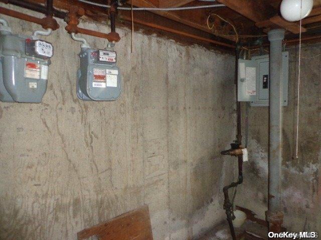 utility room featuring electric panel