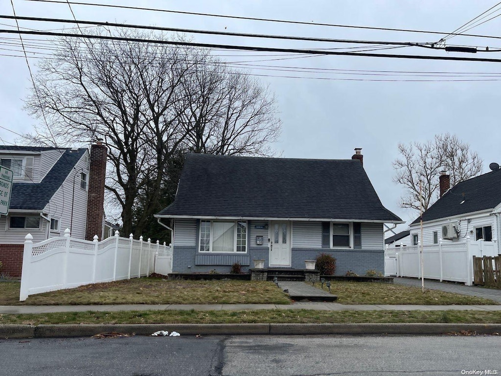 200 Raff Ave, Elmont, NY 11003 - view of front of property featuring entry steps and a shingled roof