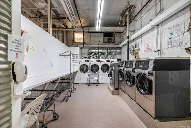 washroom with washer and dryer