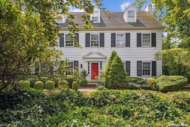 203 Albon Rd, Hewlett Harbor, NY 11557 - colonial house featuring a chimney