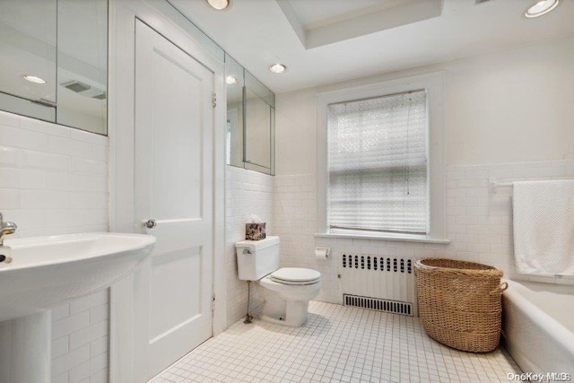 203 Albon Rd, Hewlett Harbor, NY 11557 - bathroom with radiator, tile walls, tile patterned floors, toilet, and recessed lighting
