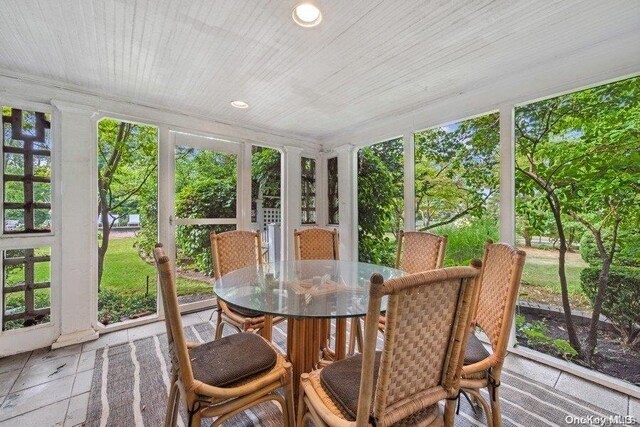 203 Albon Rd, Hewlett Harbor, NY 11557 - sunroom with outdoor dining space, recessed lighting, and tile patterned floors