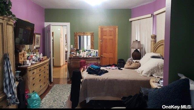 bedroom featuring light hardwood / wood-style flooring