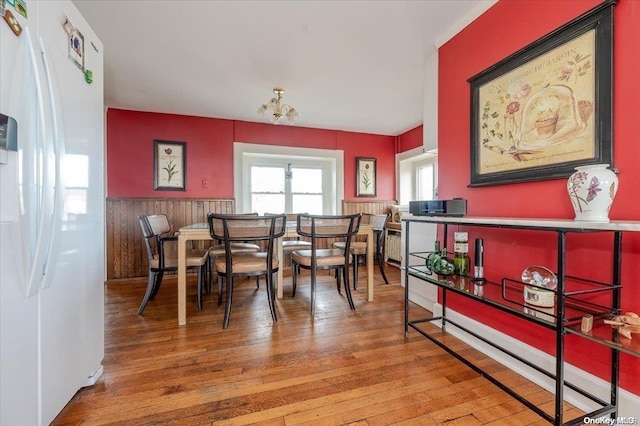 dining room with hardwood / wood-style floors