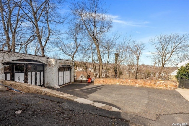 view of yard featuring a garage