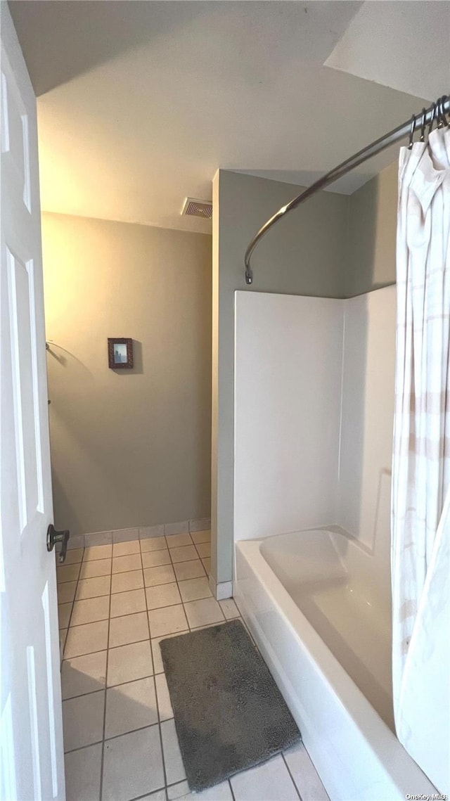 bathroom with tile patterned flooring