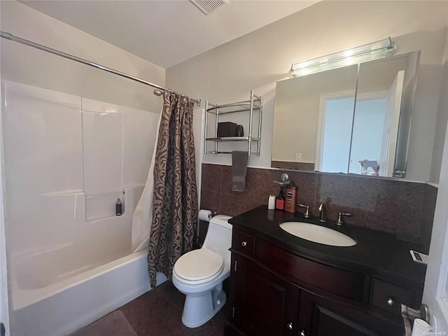 full bathroom featuring decorative backsplash, toilet, shower / bath combo with shower curtain, and vanity