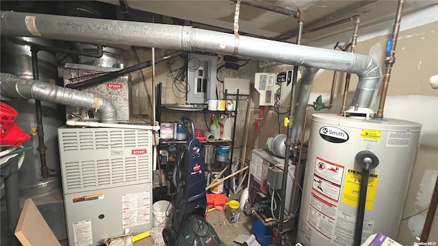 utility room featuring water heater