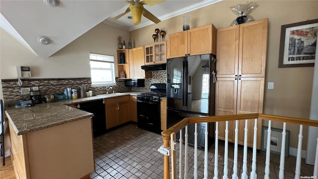 kitchen with sink, tasteful backsplash, dark stone counters, black appliances, and ornamental molding