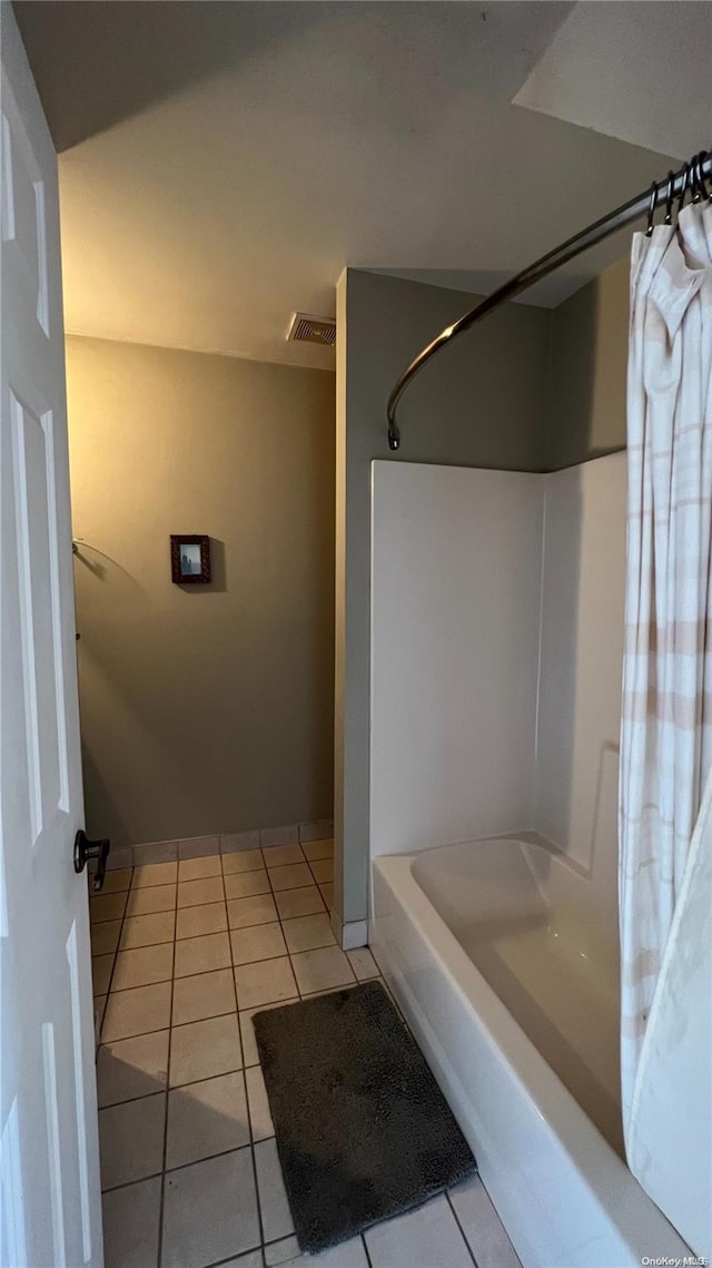 bathroom featuring tile patterned flooring