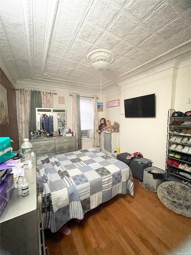 bedroom featuring hardwood / wood-style floors