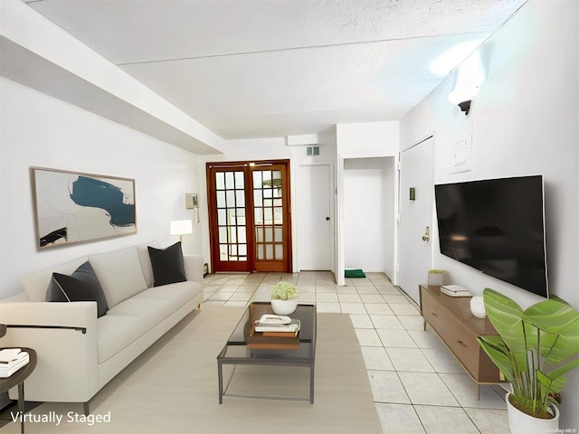 tiled living room with french doors