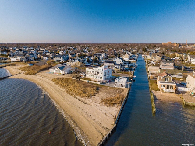 aerial view featuring a water view and a beach view