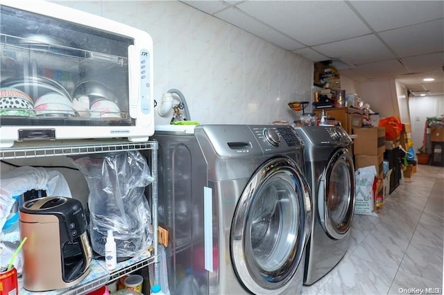 washroom featuring separate washer and dryer