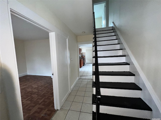 stairs with parquet floors