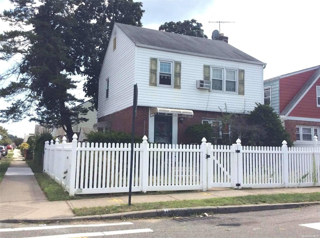 view of front of property with cooling unit