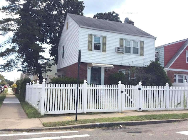 view of front of property with cooling unit