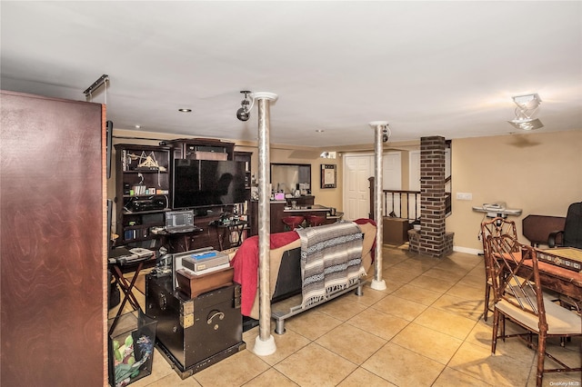 tiled living room with decorative columns