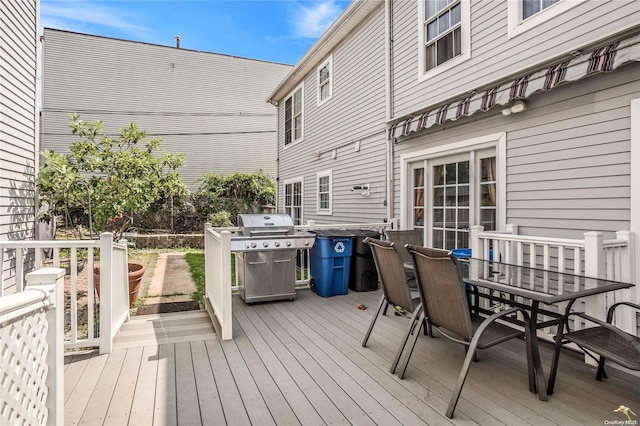 wooden deck with area for grilling