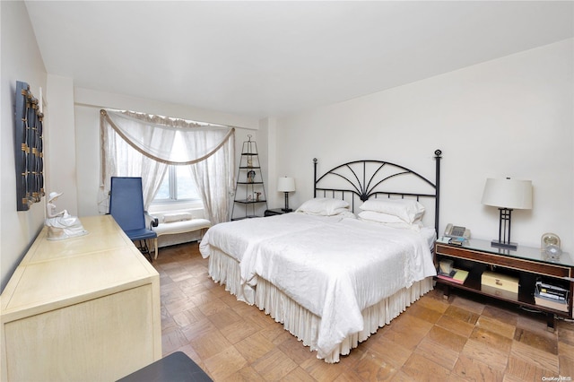 bedroom featuring parquet floors