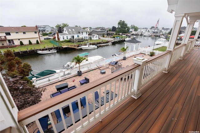 deck featuring a water view