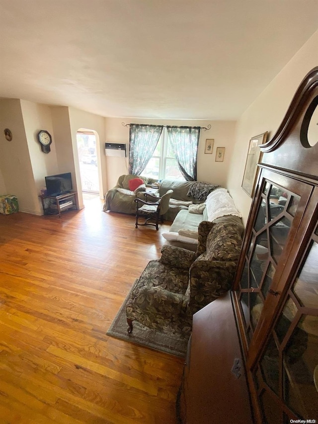 living room with light hardwood / wood-style floors