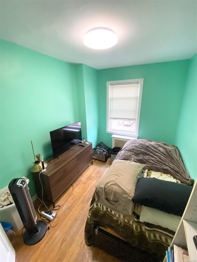 bedroom featuring hardwood / wood-style floors