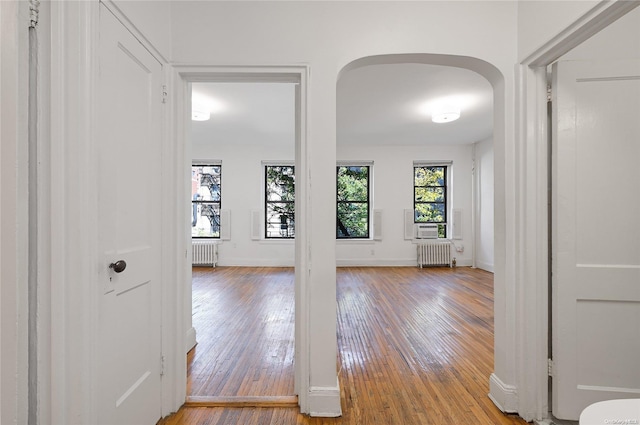 interior space featuring light hardwood / wood-style floors and radiator