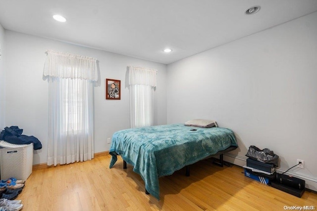 bedroom featuring hardwood / wood-style flooring