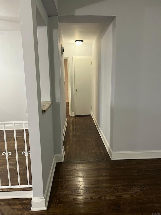 hall featuring dark hardwood / wood-style floors