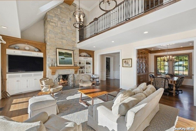 living room featuring dark wood-type flooring, high vaulted ceiling, crown molding, a fireplace, and beam ceiling