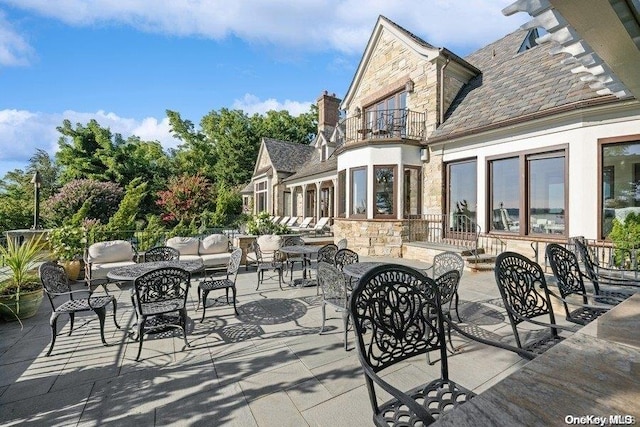 view of patio / terrace with a balcony