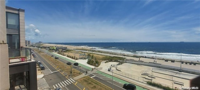 view of water feature with a beach view