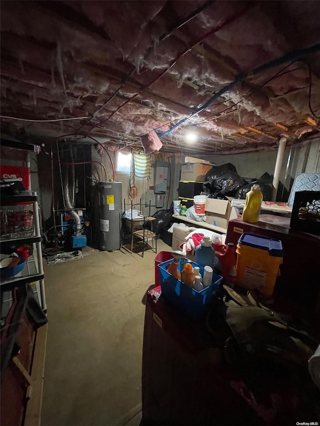 basement with electric water heater and electric panel