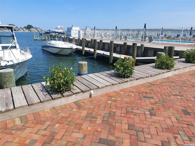 view of dock with a water view