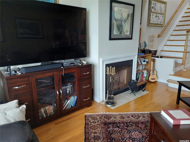 living room with light hardwood / wood-style flooring