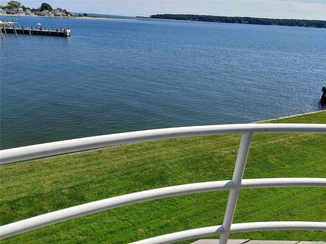 view of water feature with a dock