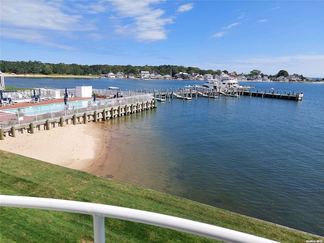 dock area with a water view