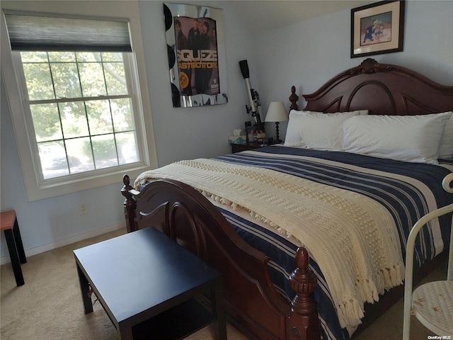 bedroom with light carpet