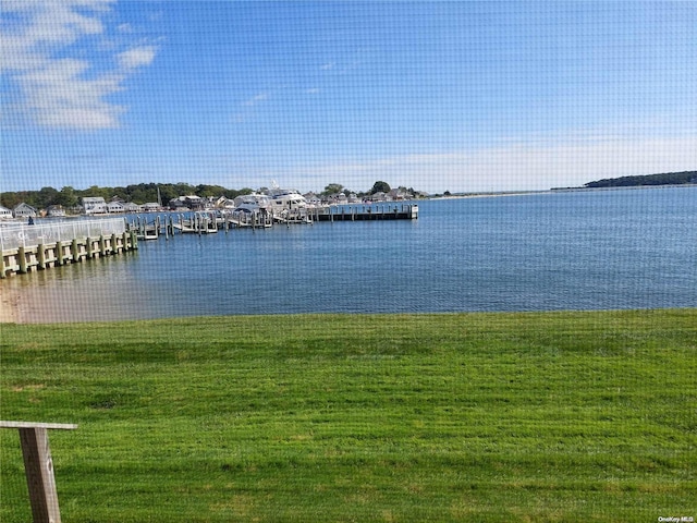 property view of water featuring a boat dock