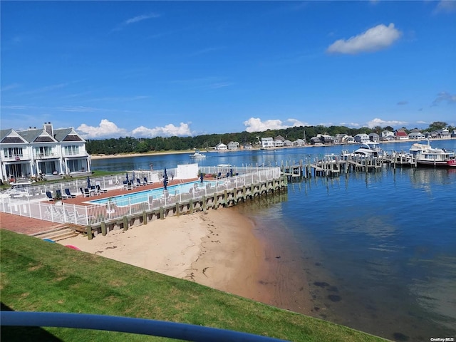 dock area with a water view